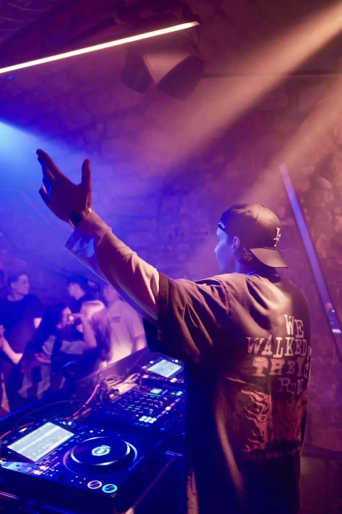 C-MON at the decks in purple light